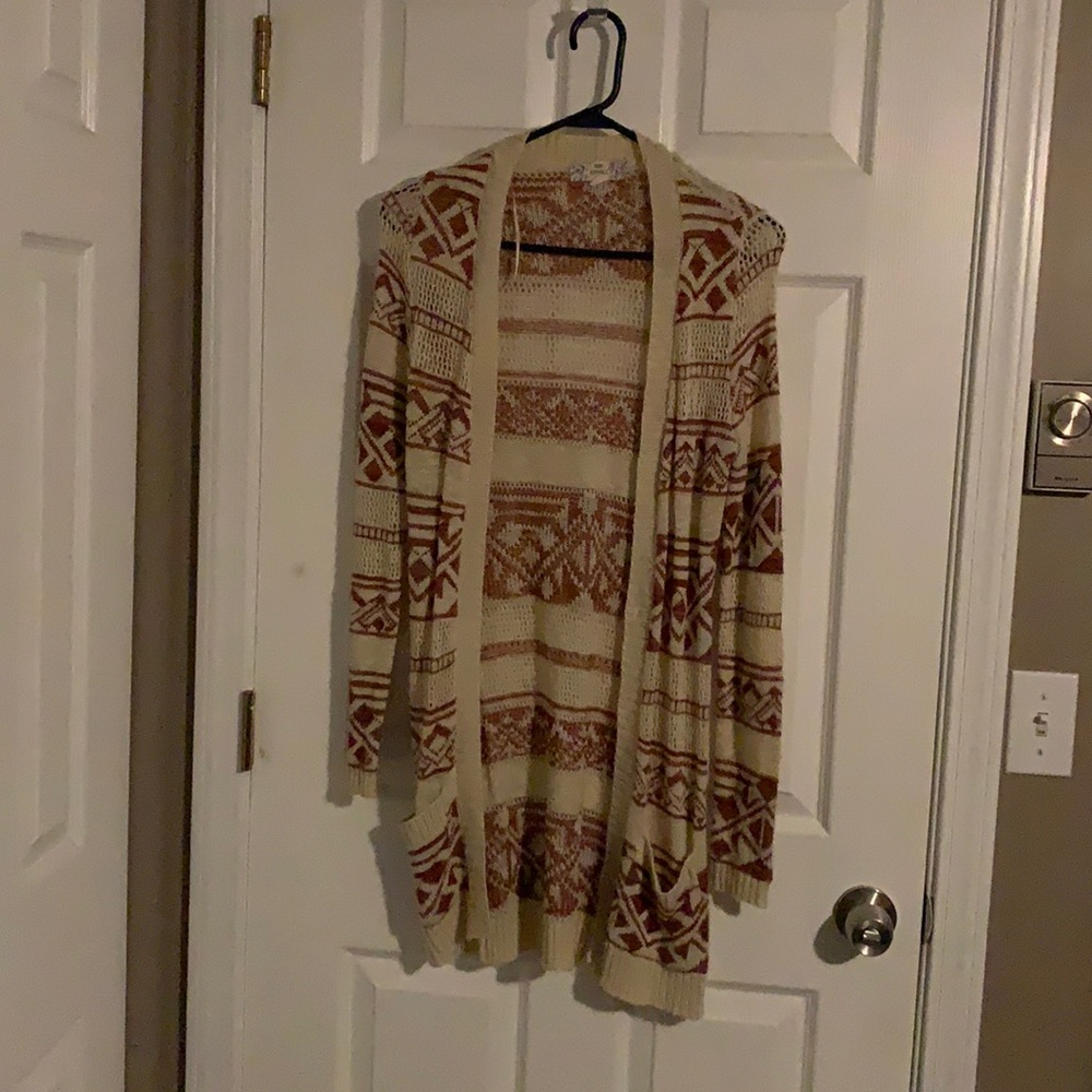 Small, tan and maroon cardigan